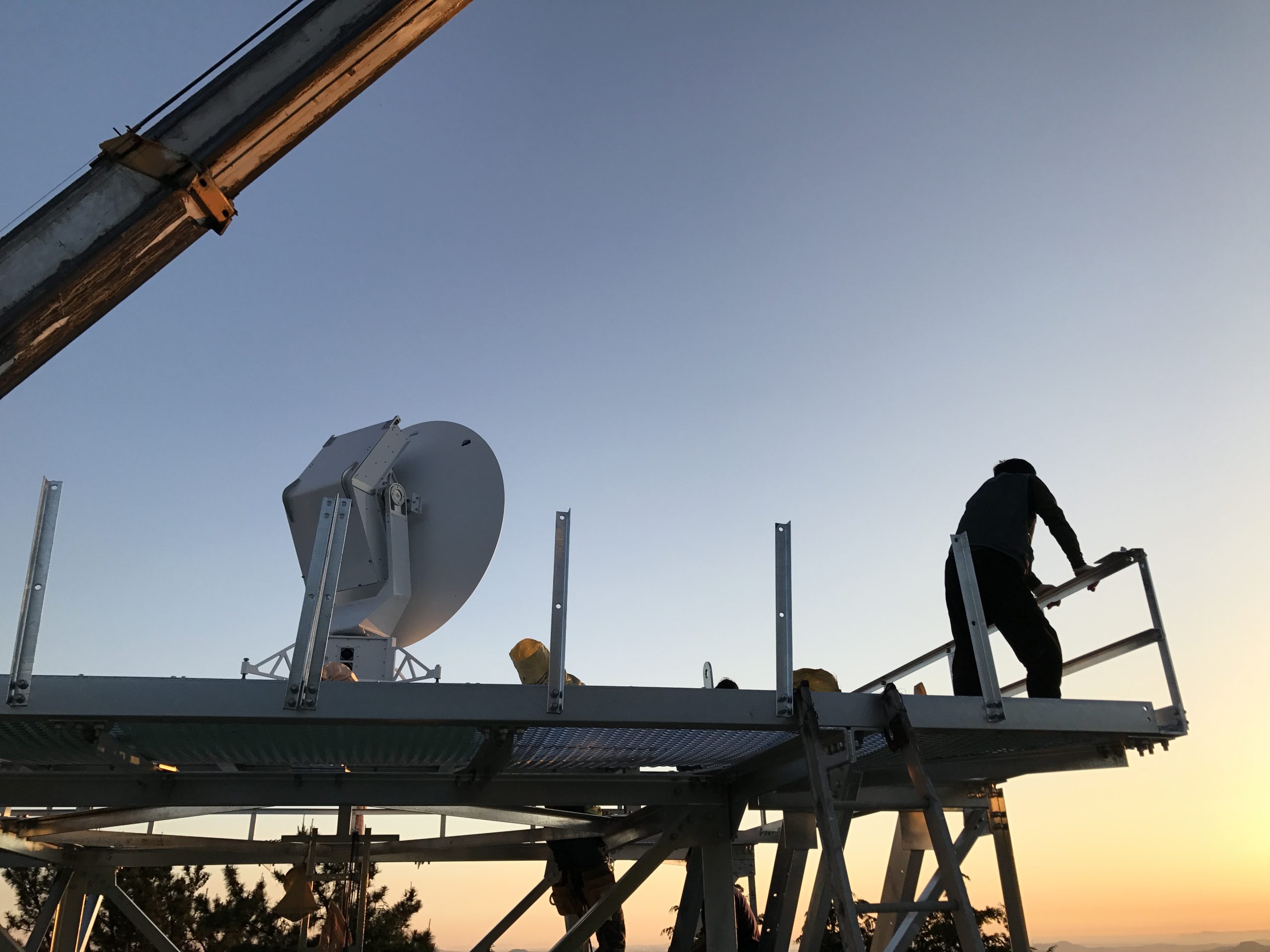 The E800 Dual Polarization Weather Radar being installed on an elevated platform.